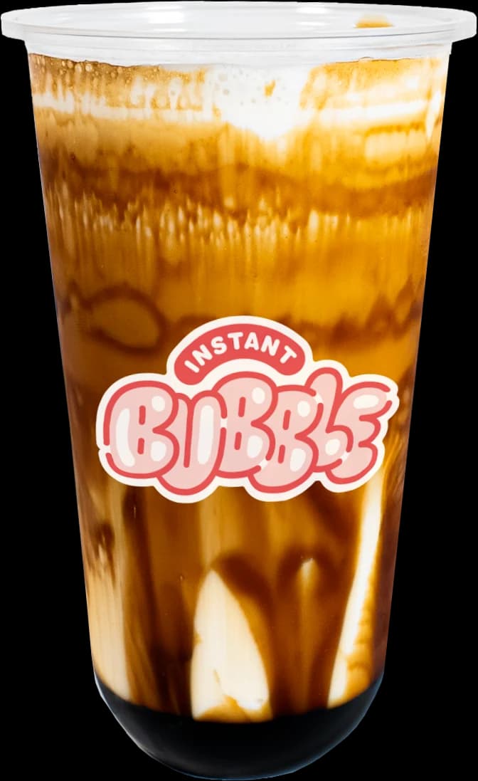 Un bubble tea au lait, perles de tapioca au fond, dans un gobelet Instant Bubble